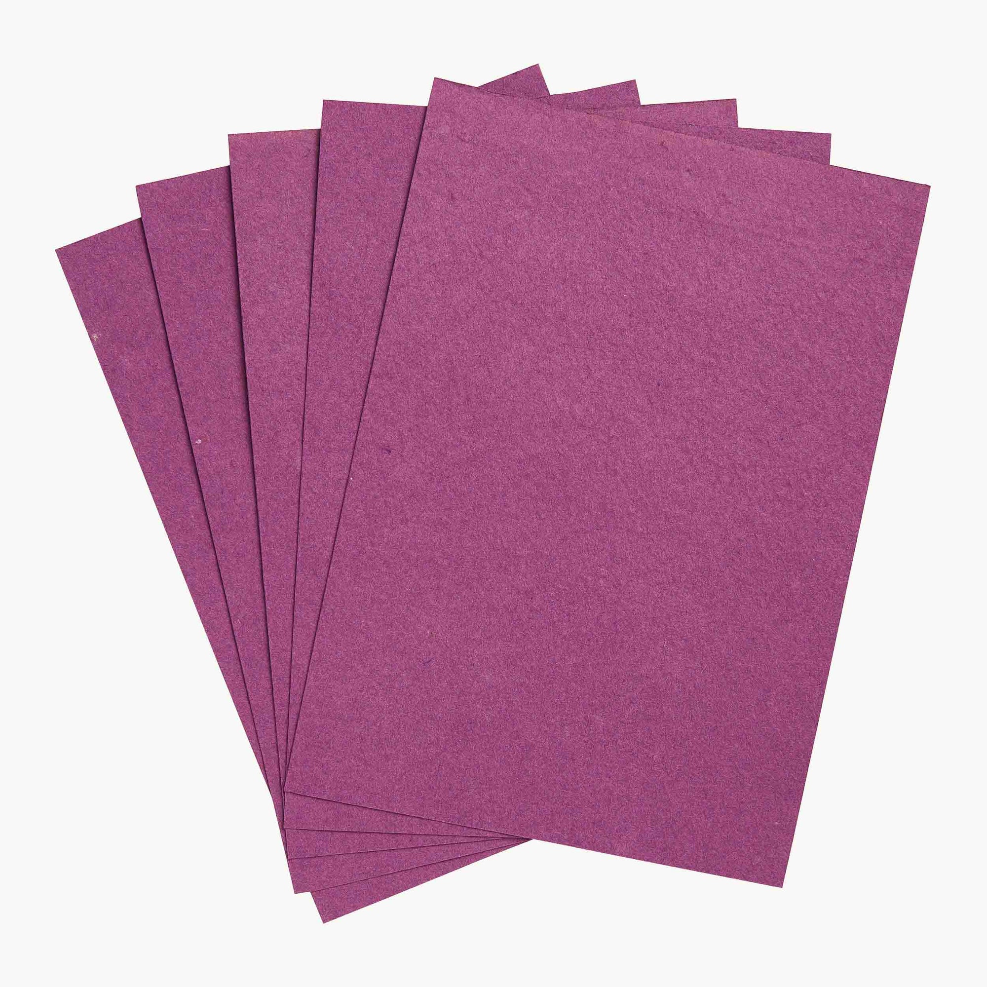 Purple coloured vegetable seed paper made using tomato and chilli seeds